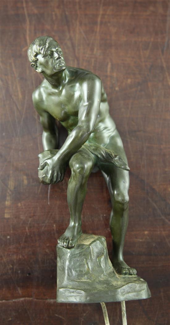 A Titze Austrian 20th century, Steinwerfer, patinated bronze of a nude male, 9in.